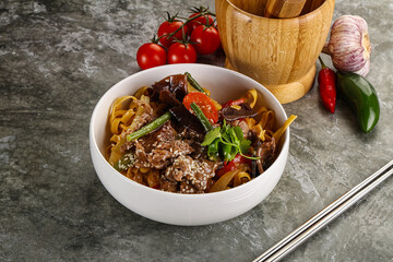 Asian wok with noodle, vegetables and beef