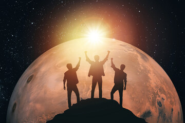 Silhouette of three people against the background of Mars. Elements of this image furnished by NASA