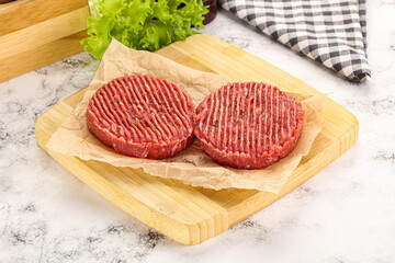 Raw beef  burger cutlet for grill