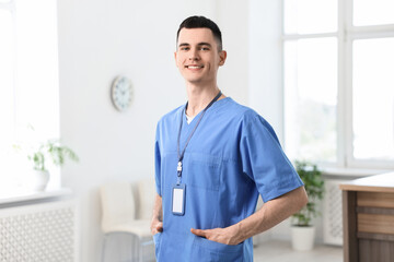 Portrait of smiling medical assistant in hospital