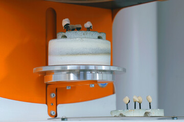 Press oven machine for denture production in the stomatology laboratory.