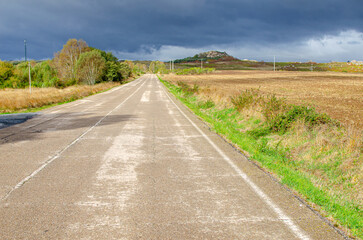 straight empty road on an overcast day