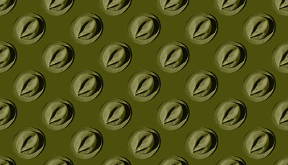 Pattern of hunter hats on green pastel background