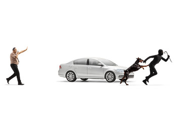 Security officer and a dog running after a car robber