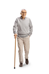 Elderly man with a cane walking towards camera