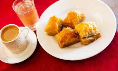 Traditional Turkish dessert baklava with walnuts and honey