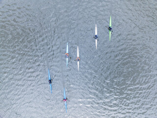 Kayaking top view. Group of kayaks rowing. Aerial view from drone.