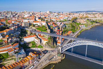 Obraz premium Aerial view of famous historic Porto city, center with Luis I Bridge over Douro river