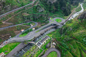 Intersection of highway and tunnels on Madeira island in countryside, transport infrastructure of...