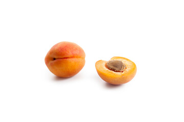 Apricot fruit whole and half isolated on white background..