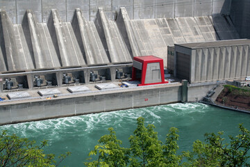 A huge hydro electric power plant on a river.