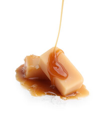 Pouring delicious salted caramel on candies isolated on white