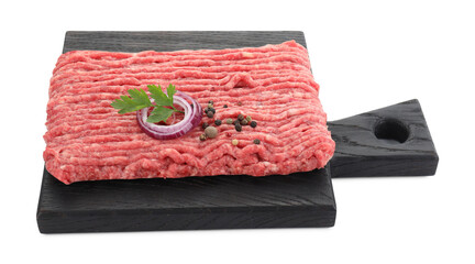 Board with raw ground meat, onion, peppercorns and parsley isolated on white