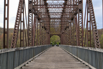 railway trestle bridge detail (steel and wooden crossing over croton reservoir) pedestrian walkway for biking cycling converted to rail trail (putnam railroad) yorktown heights new york (walking bike) © Yuriy T