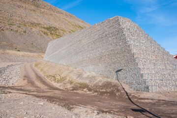 Avalanche protection barrier in town of Patreksfjordur in west Iceland