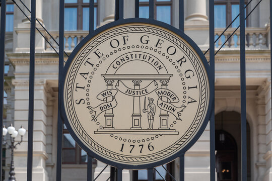 Official Round Circular Great Seal of the State of Georgia, seen on the fence outside the Capitol Building in Atlanta