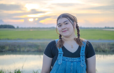 Portrait beautiful fat chubby asian woman girl farmer one person sitting freedom looking smile...