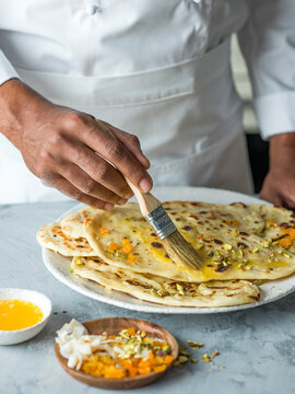 Peshwari Naan, brush melted butter and sprinkle with apricot, pistachio and coconut.fff