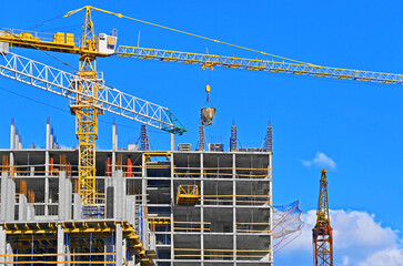 Building construction site with crane