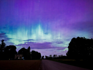 The Aurora Borealis, or Northern Lights, are a natural light display in the Earth's sky, primarily seen in high-latitude regions. They appear as colorful, shimmering curtains or arcs.