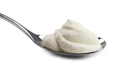 Silver spoon with sour cream isolated on white