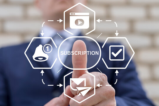 Business man working on virtual touch screen presses button with word: SUBSCRIPTION. Subscribe to video channel. Subscriptions for social media. Business Web Promotion Marketing Concept.