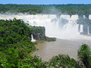 Rainforest and the Iguazu River with the falls in the background. Misiones, Arg.