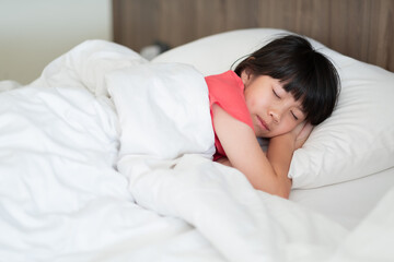 asian kid sleep on bed, sick child