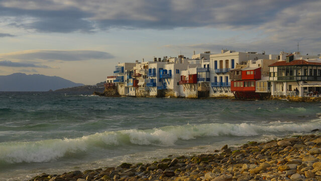 Colorful buildings along the ocean in Mykonos, Greece