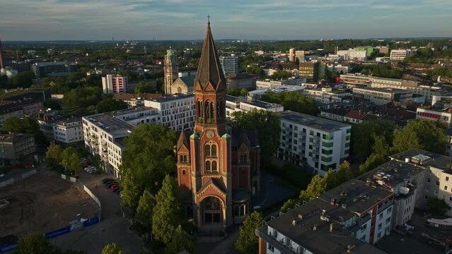 Aerial drone view of Crosses Church, also known as Kreuzeskirche, in Essen, Germany. 