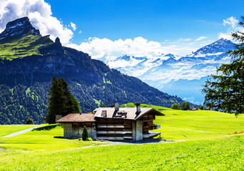 Soaring high, the valleys unfold below.