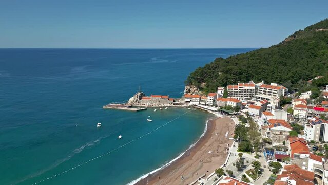 Petrovac town in Montenegro aerial view. Tourist attraction and vacation destination