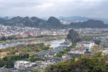 aerial of Guilin town with sunset glow ,beautiful karst mountain scenery,China