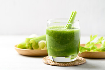 Celery green juice in glass on white background, Healthy drink for detox