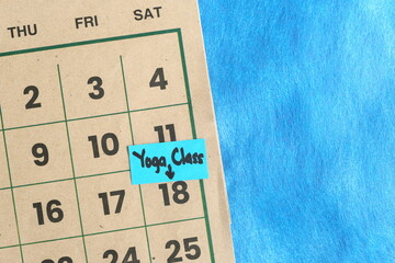 Weekend yoga class reminder on calendar. Weekend wellbeing and wellness activity.