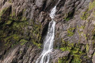 Fototapeta premium Mountain waterfall, Wawushan National Forest Park, Meishan city, Sichuan province, China