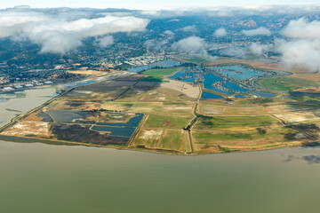 Aerial view of patterns of agricultural fields and Bel Marin Keys in the Sacramento River Delta