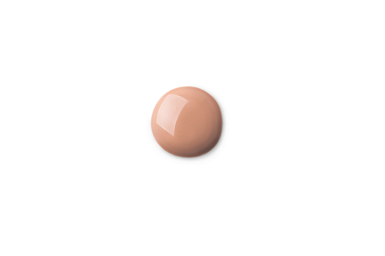 A foundation shade swatch, round shape. Make up smear swatch foundation smudge texture isolated on a white or transparent background