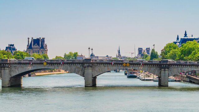 A timelapse of the Eiffel Tower along the river Seine with flyboats passing by with motion blur.Sunny but cloudy spring summer day paris city famous riverside bay tower view bridge timelapse panorama