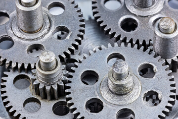 old metal cogwheels macro view. industrial background.