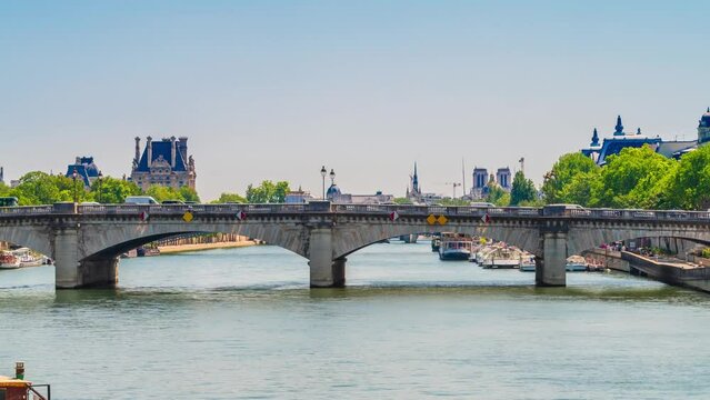 A timelapse of the Eiffel Tower along the river Seine with flyboats passing by with motion blur.Sunny but cloudy spring summer day paris city famous riverside bay tower view bridge timelapse panorama