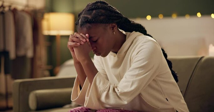 Night, worship and prayer in home with woman meditate for spiritual faith, hope and gratitude. Girl, praying and practice mindfulness or thank you god, Jesus and Christian trust in spirituality