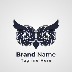 Owl Camera Logo, combination of two camera lens shaped Owl head