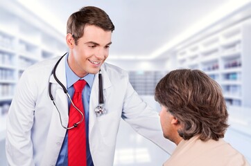 doctor consulting patient, discussing result in office