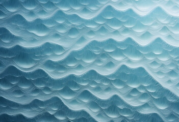Obraz premium Abstract pattern resembling ocean waves in shades of blue and white.