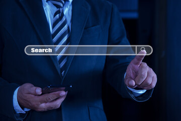 Businessman using smartphone clicking internet search page on virtual screen. Searching Browsing...