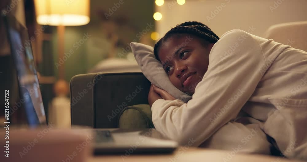 Canvas Prints African woman, laptop and movie on sofa to relax in night for streaming, break and online subscription in home. Girl, person and computer for film, series and screen with smile on couch living room