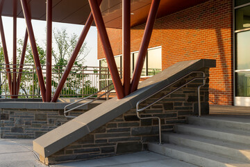 Example of a stainless steel railing along an exterior set of stairs at a public, commercial building.