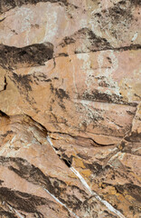 Geological structure of a section of rocky soil in a mining quarry