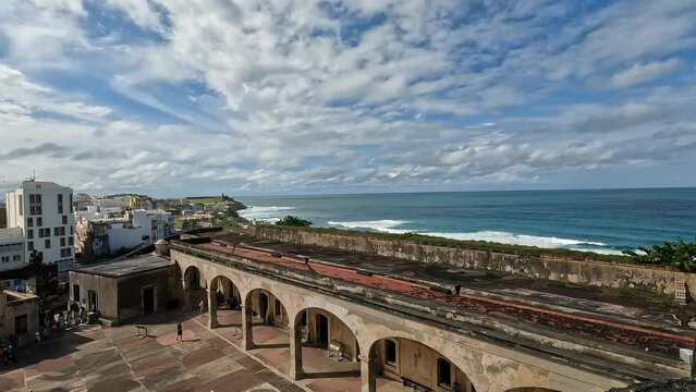 walking in the courtyard of castille san cristobal in san juan puerto rico (historic site on caribbean island) travel tourism destination national park sightseeing spanish ruins old city center tour